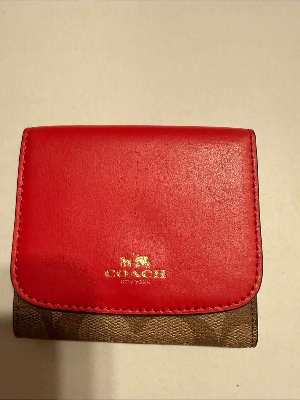 Coach‎ Trifold Wallet in pink  and Brown